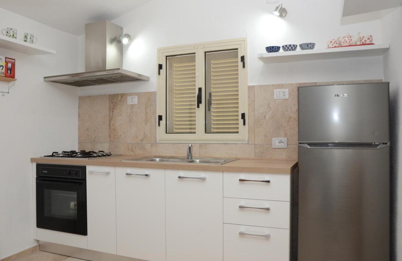 Apartments Villa Corrias Cala Liberotto Exterior photo